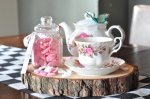 Alice in Wonderland inspired table centrepiece with vintage tea set and pink shrimps